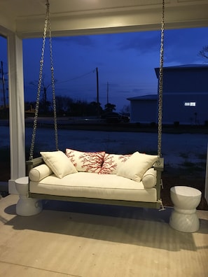 Night time view on porch swing