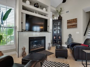 Inviting living room in main house with huge Smart TV!
