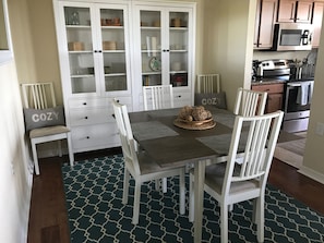 Dining area seats six comfortably.