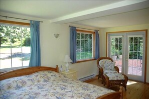 Master bedroom with French doors to terrace