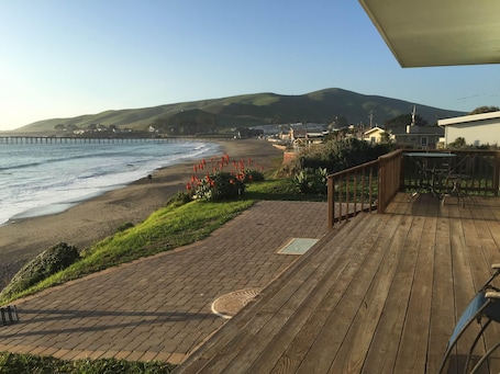 Endless ocean views from the deck and private stairs to the beach.