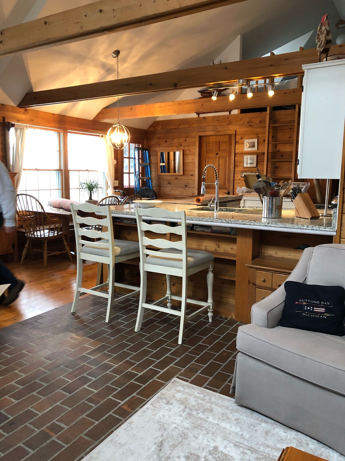 Big Sandy Beach !Walk to Village! Suttons Bay Waterfront Cottage.