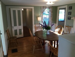The dining room easily accommodates guests.