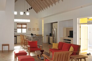 Kitchen -living room. Rear courtyard to right.