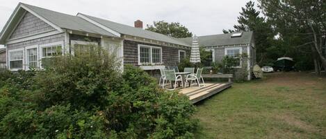 Sunroom windows face Pocomo Bay, deck view rivals Madaket sunsets!