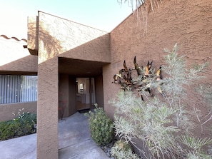 Front door entry. Patio facing south.