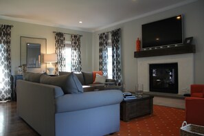 Relax in the living room.  Great area to have a family game or movie night.