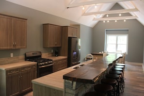 Gas stove, large breakfast bar, energy efficient dishwasher and refridgerator