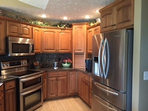 Kitchen is convenient and open to the living  and dining area.