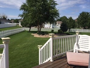 Back view of yard off of deck.  Perfect for yard games (which we do have!)