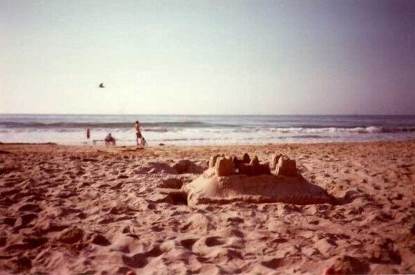 Build a sand castle or frolic in the surf