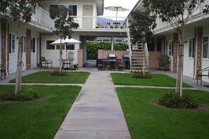 Enjoy bbq and picnic tables in our central courtyard.