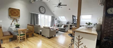 High ceilings and picture window with view are dramatic in the living area.