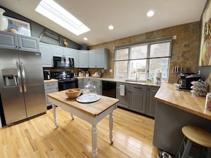 Full size appliances in the kitchen and loads of counter space.