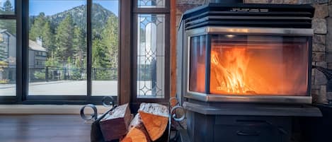 Cheery woodstove in living room.