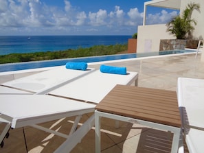 Private 30' infinity edge lap pool overlooking Caribbean ocean