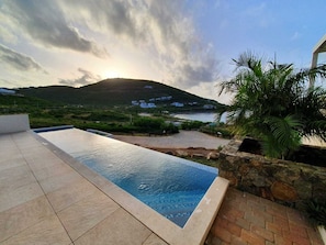 sunrise view from the private pool deck