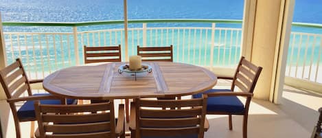 Teak table seats 4 and expands to 6. GORGEOUS BEACH VIEWS WEST AND SOUTH