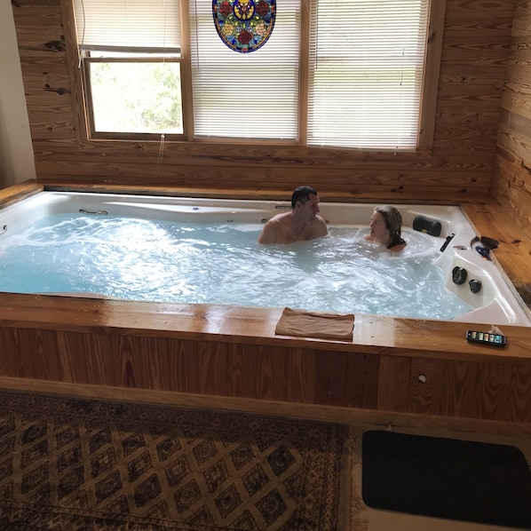 Relax in the amazing swim spa/ jacuzzi in the 900 sq ft Spa Room.   6 adults 