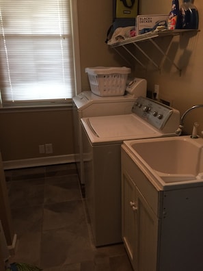 Laundry Room with additional shower and toilet.