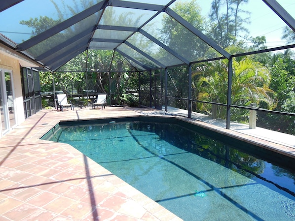 Salt water private pool inside fully screened-in lanai.