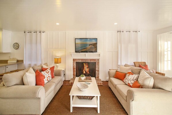 Living Room with 65” OLED HD Smart TV & over 200 channels &  On Demand Movies