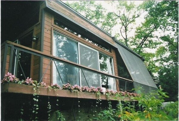 Top to bottom screens enclose eating deck for Spring thru Fall dining