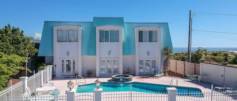 Outside view of the home and pool