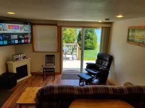 Main Living Area with 58 inch smart TV and view of lake