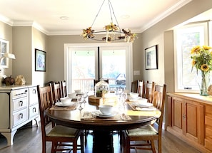 DINING ROOM - Table seats ten with French doors & buffet window looking at lake.