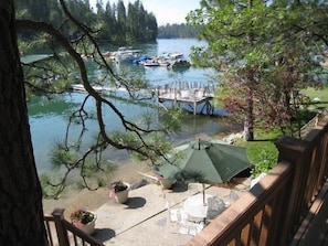 Summertime view of lake from the main level deck - lower patio table seats six