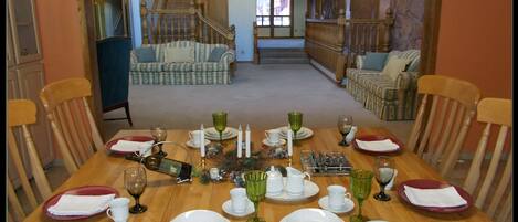 Dining table looking toward the living area and loft - bedroom