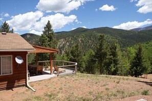 Covered custom deck with outdoor speakers