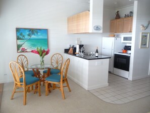 Ocean-View Dining Area and Completely Equipped Kitchen.
