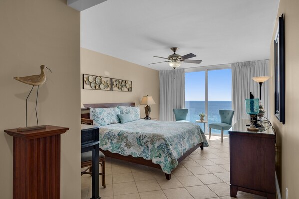Master suite, king bed, seating area, flat screen, tv, desk/makeup area