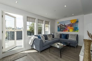 Living Room - Custom Art and connected to an outdoor Terrace 