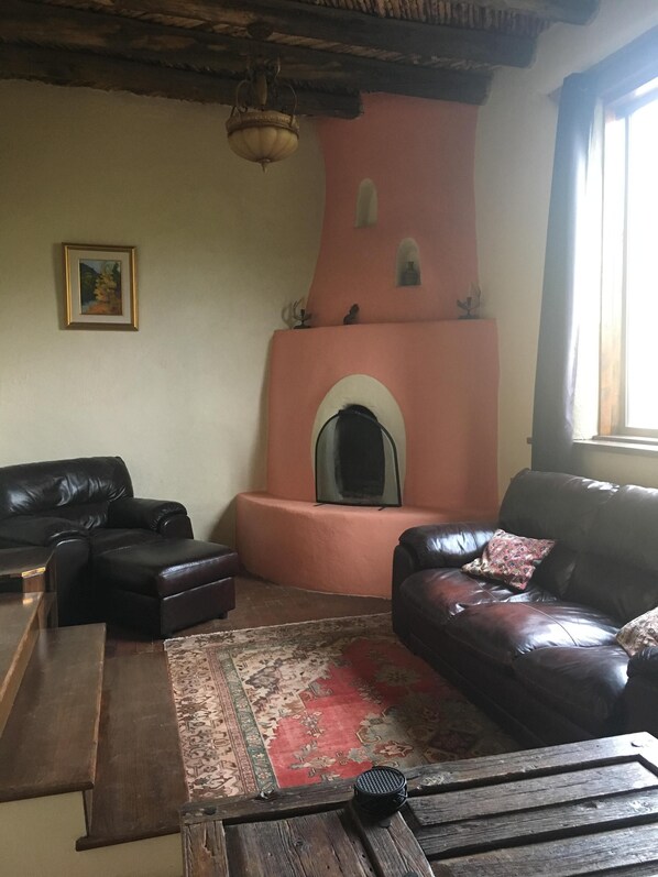 Living room with working Kiva fireplace