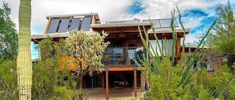 Solar home with elevated deck-view from patio.