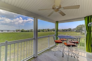 Screened-In Patio with Dining and Shade Overlooking Water & Marsh