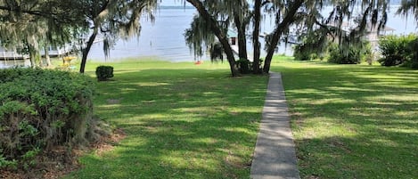 Steps from the porch to the Lake.