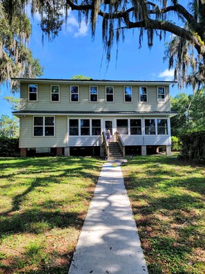 The front of house, with Lake in background.