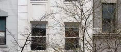 3000sf  triplex unit  Enlarged windows in renovated facade provide maxim light 