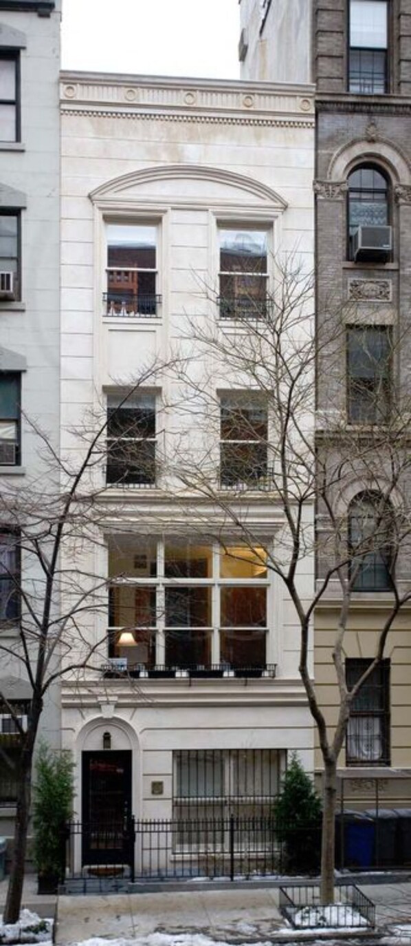 3000sf  triplex unit  Enlarged windows in renovated facade provide maxim light 