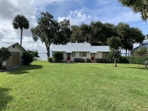 Front yard / parking area (two entrances / not a duplex).
