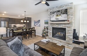 Large flat screen TV and cozy fire place