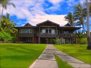 The house faces the beach - and the cement
path has quite a history.