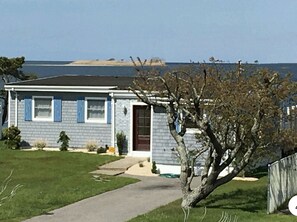 Beautiful updated open floor plan Fire Island style home steps from the water.