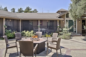 Fire pit, bbq patio, background: enclosed outdoor dining porch