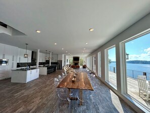 The main living area, open plan w views from every angle, dining table sits 12!