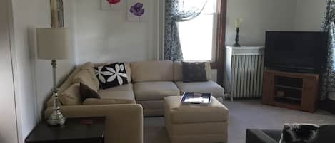 living room sofa, cable tv & comfortable futon